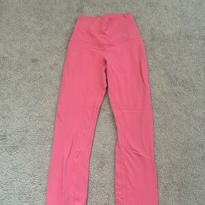 Bright pink cotton candy colored leggings from lulu lemon!